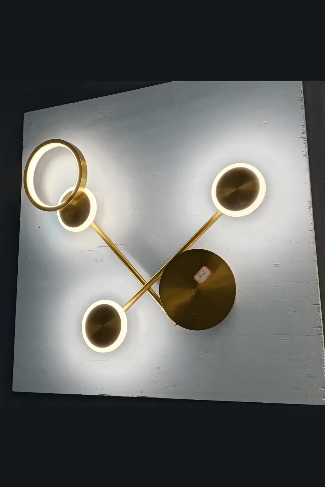Modern Gold Wall Lamp with Circular LED Design