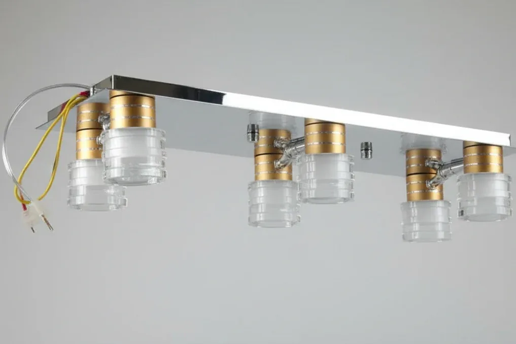 Three-light, wall-mounted light fixture