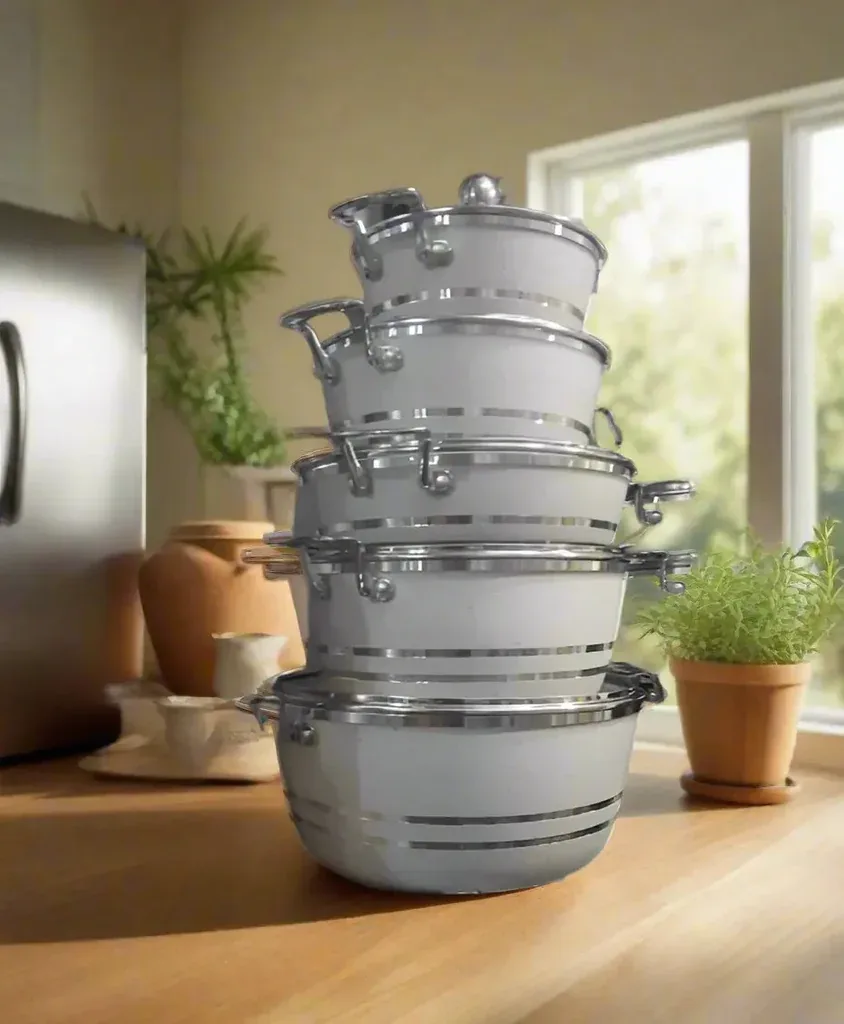 Stacked Aluminum Cooking Pot Set on Display Shelf