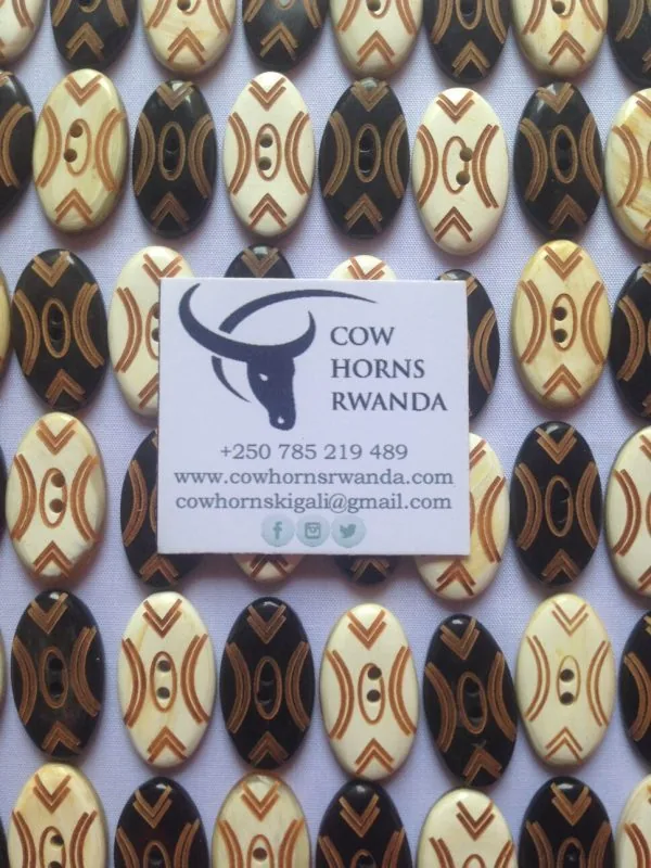 Engraved cow horn buttons